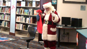 Santa talks to preschool students.
