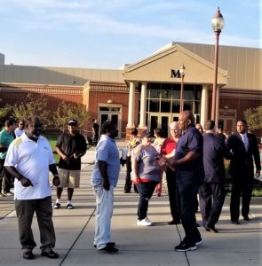 Volunteers gather at Warren G. Harding High School Tuesday, Aug. 20, to greet Warren City Schools students on the first day for the 2019-20 school year.