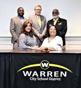 Warren City School Board of Education: Seated from left, Vice President Patricia M. Limperos and President Regina Patterson; standing from left, Andre Coleman, John E. Fowley and Robert Faulkner Sr. 